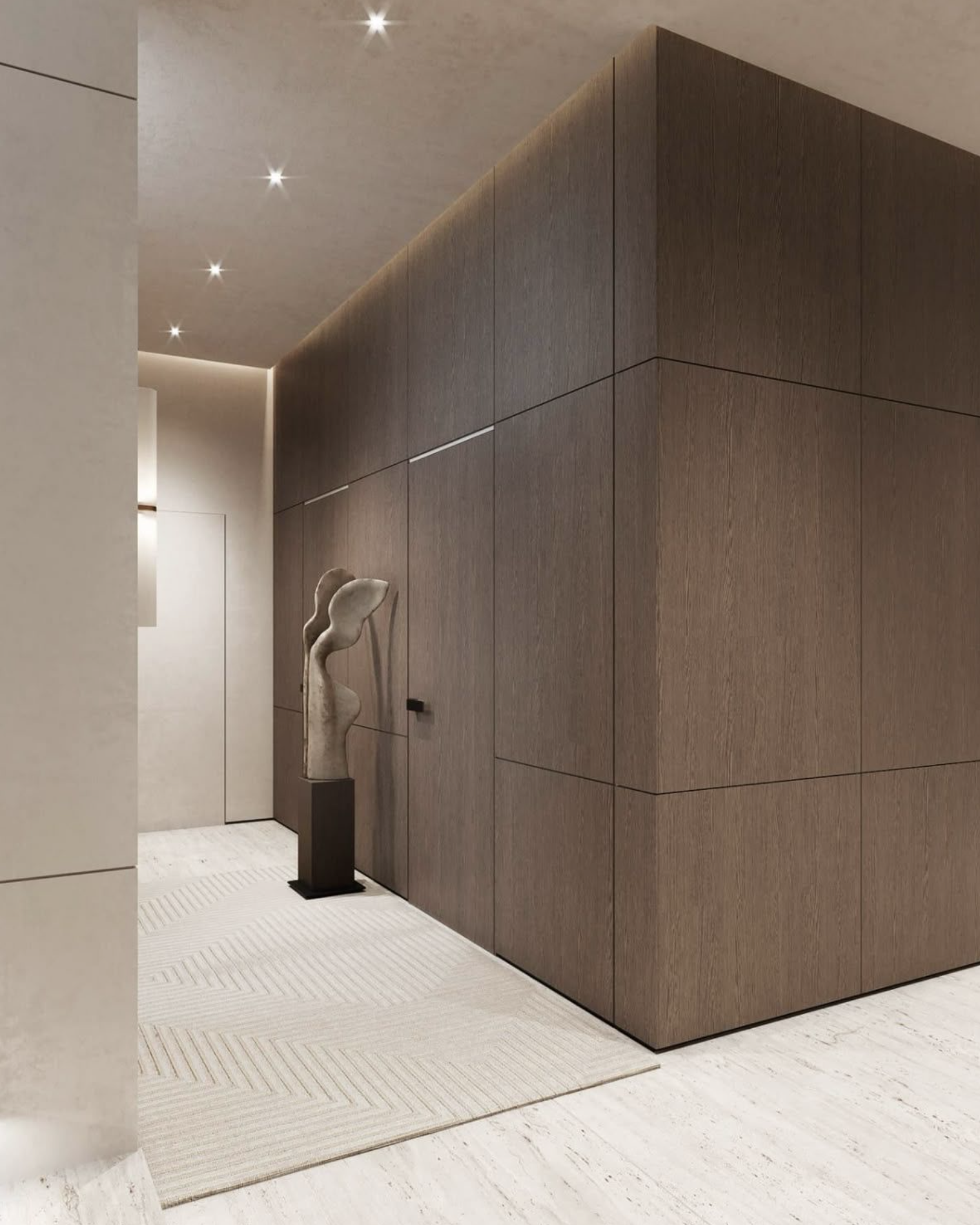 חלל רחצה שקט ומפוסל עם אבן טבעית, משטחים רחבים ותאורה רכה ומפוזרת.